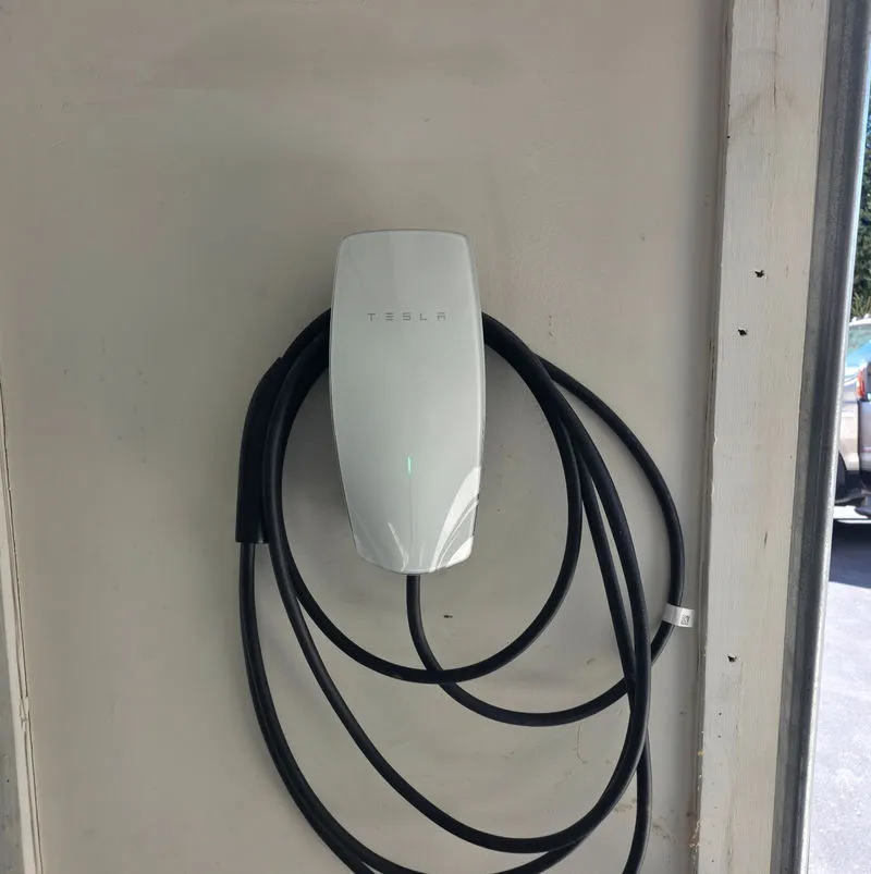 Cleanly routed EV charger wiring installation